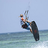 jumping kite surfer